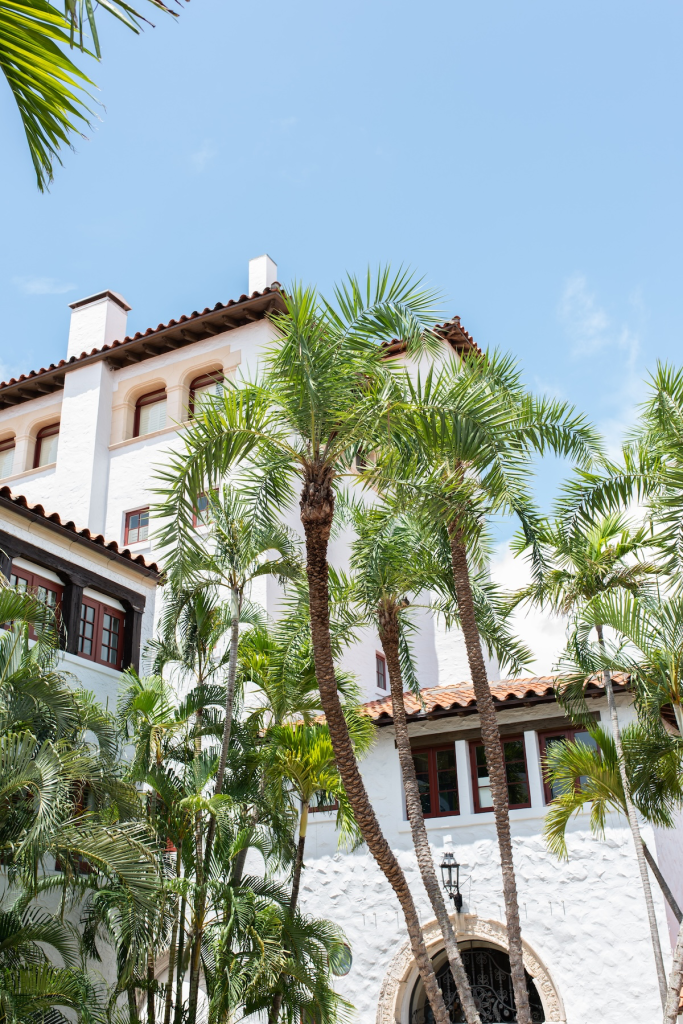 Spanish-style architecture and luxury design of custom home in Palm Beach for high-end Florida real estate investing